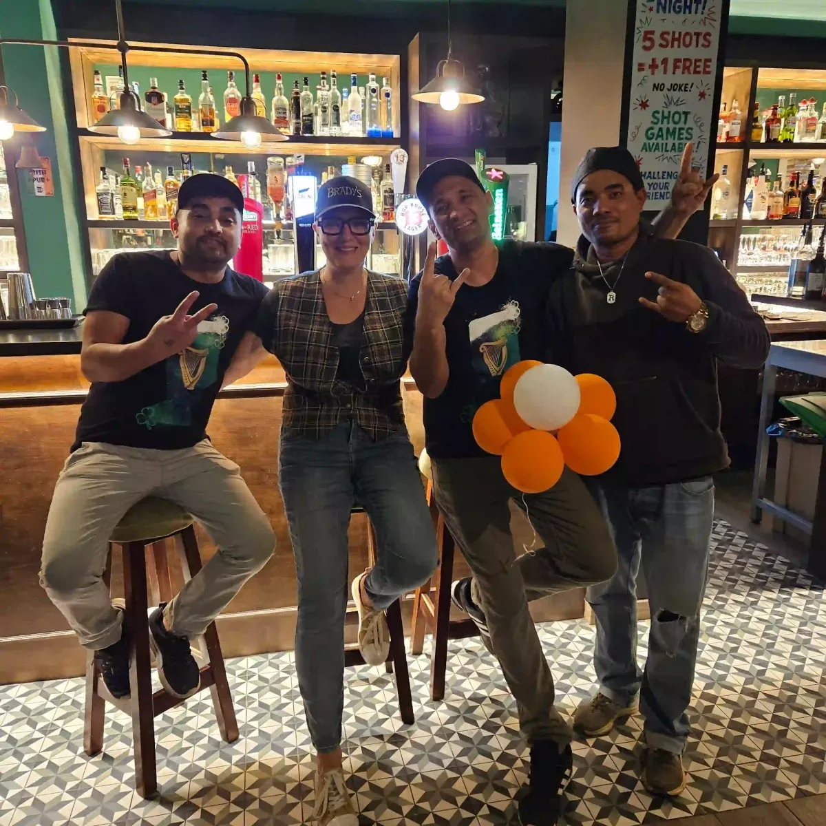 The Brady’s Irish Bar team behind the counter in Carvoeiro
