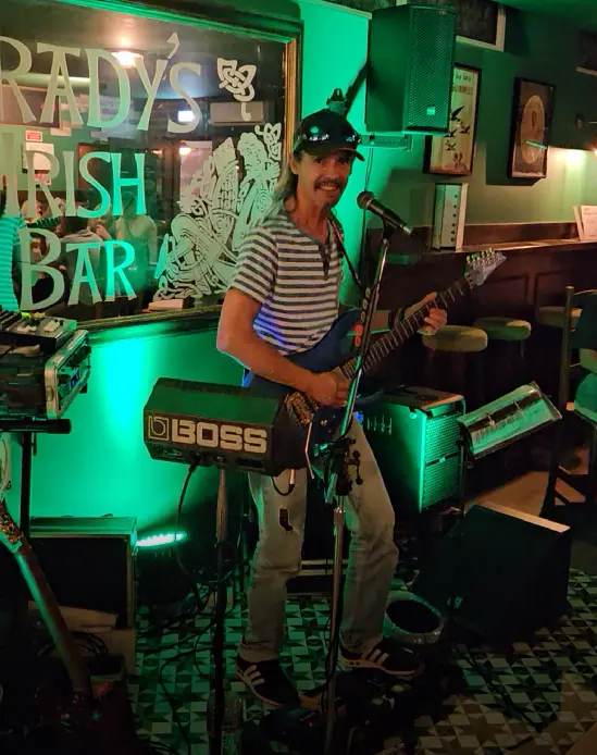 Zezinho performing live music at Brady’s Irish Bar